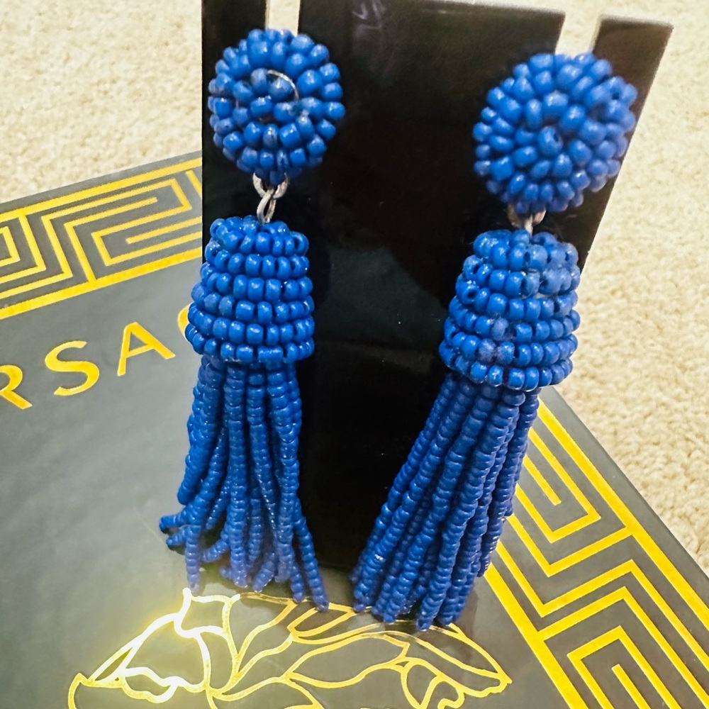 Earrings handmade with blue beads come in a blue gift box